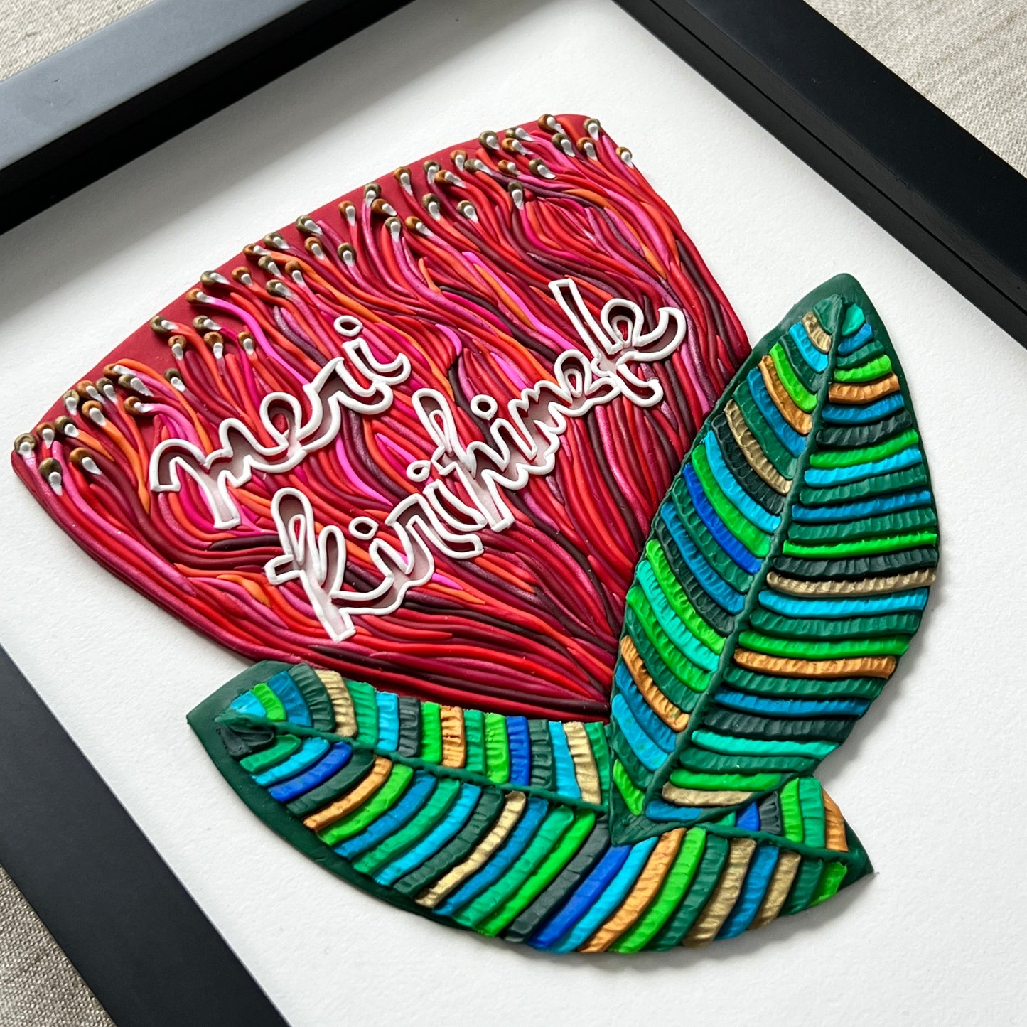 Meri Kirihimete in a Pohutukawa Flower Original Clay Art Piece