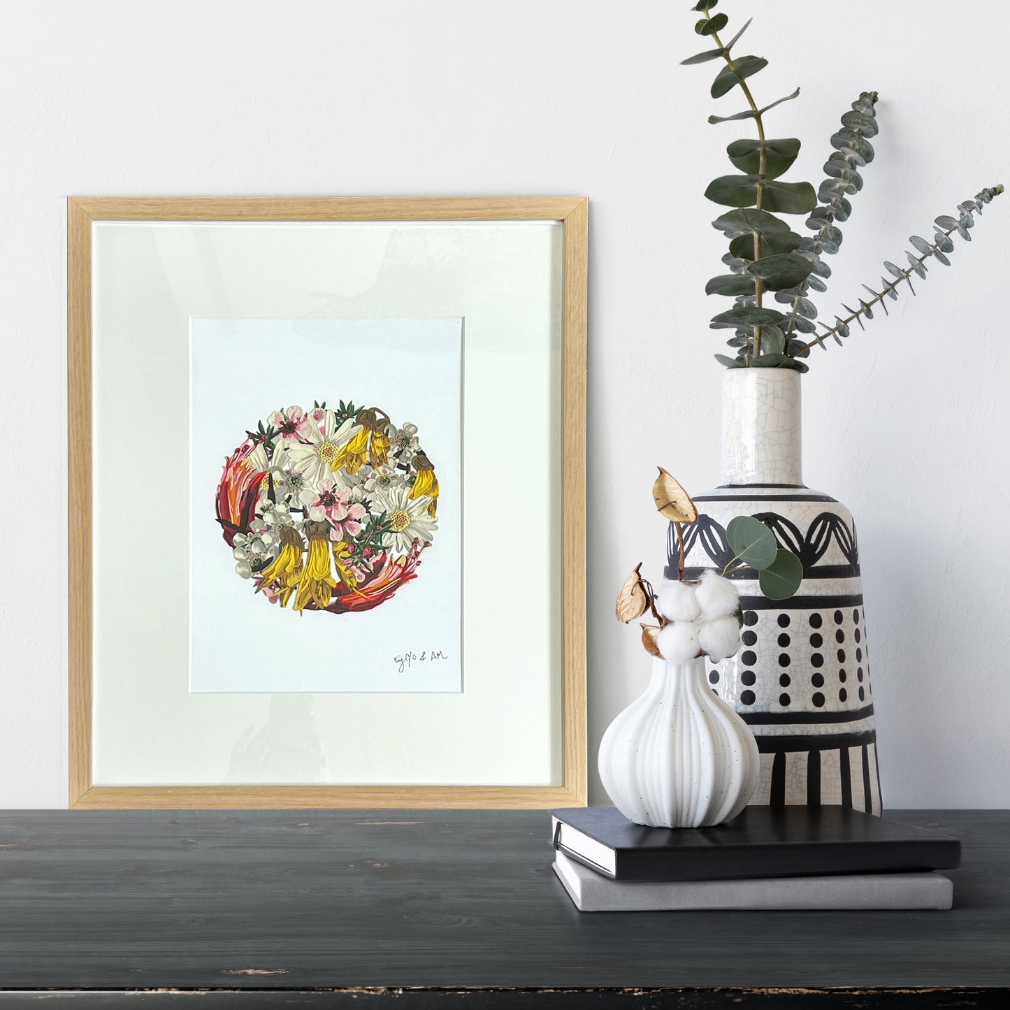 Colorful clay art piece titled 'My Floral Sunshine' showcased on a sleek black table among various decorative items.