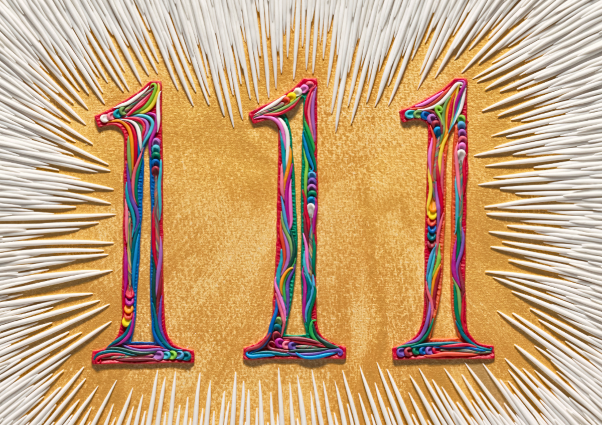 Three large stylized numbers '111' in a glossy marbled multicolor pattern made with plasticine clay, arranged vertically on a gold background surrounded by radiating white lines.