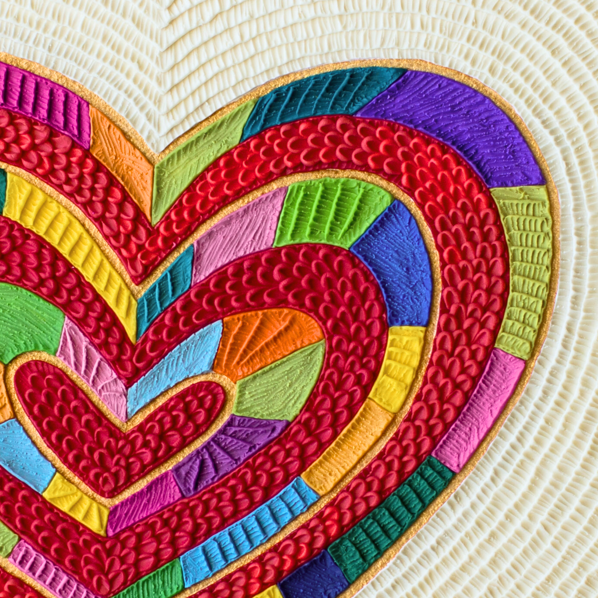A close-up of a colorful plasticine heart art print called ''I Love Me'' by clay artist Emy Oikawa from Eclo Art.