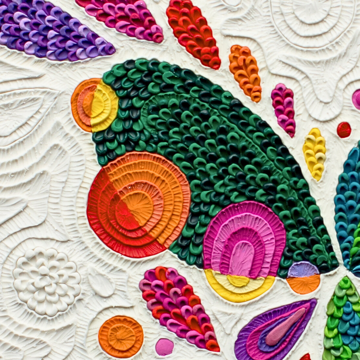 Close up of ''Transform'' (abstract of a butterfly) Plasticine Fine Art Print, with vibrant colours like purple, pink, orange, read, yellow, green and blue. By clay artist Emy Oikawa