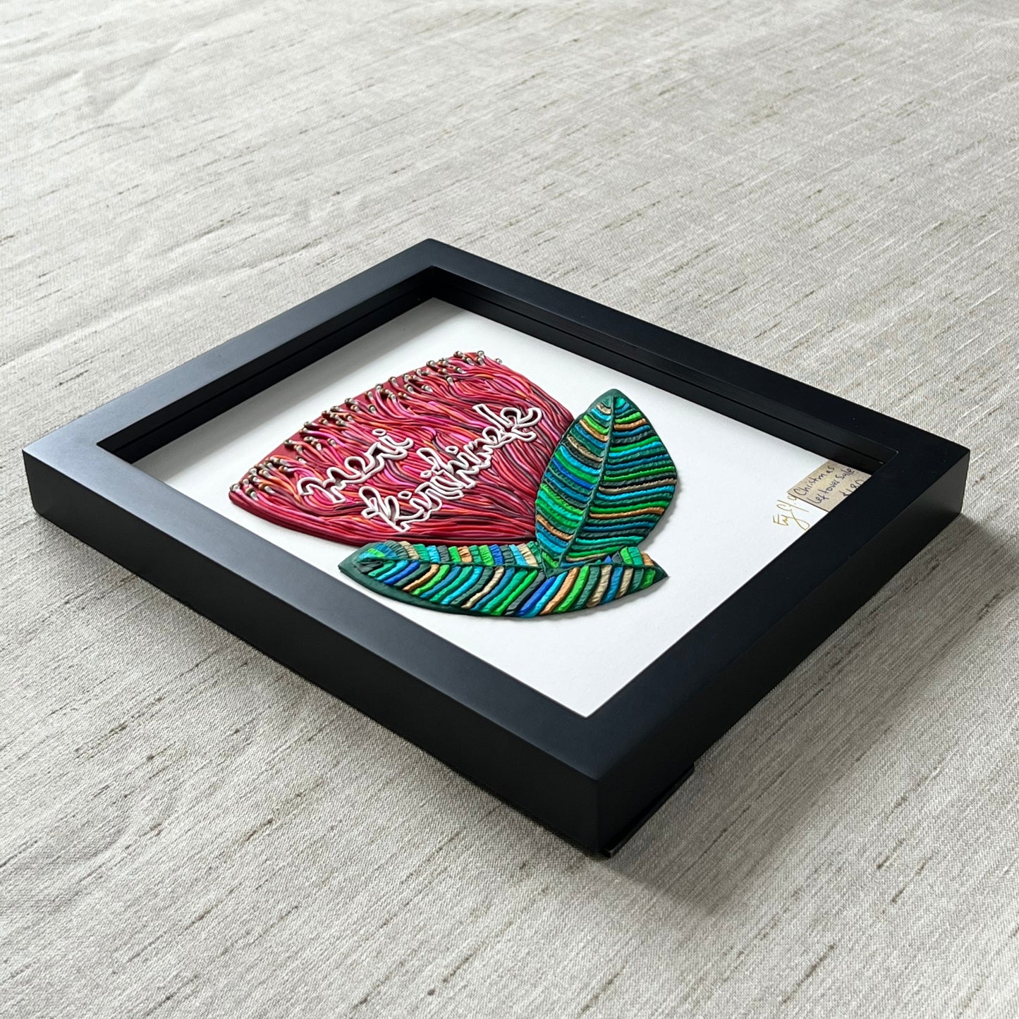 Meri Kirihimete in a Pohutukawa Flower Original Clay Art Piece