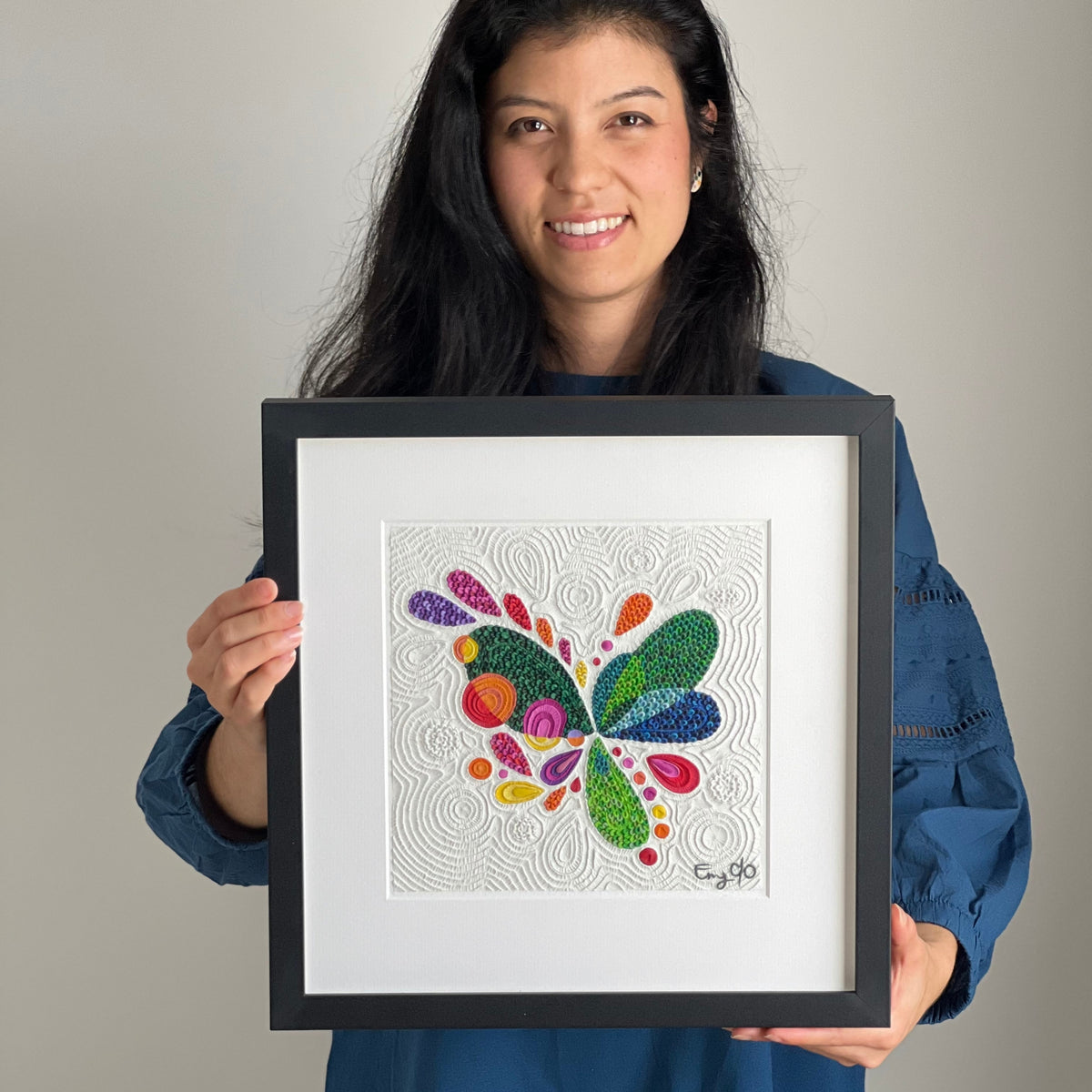 Transform clay art piece hold by artist Emy Oikawa.
