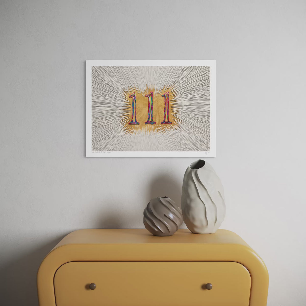 Close up video of an A3 art print featuring the number 111 (angel number) in a colorful gradient made with plasticine over a golden background, displayed on a light gray wall above a mustard yellow cabinet with two decorative vases. Art by Emy Oikawa from Eclo Art.